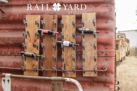 wine-storage-rusted-red-distressed-weathered-railcar-boxcar-rail-yard-studios